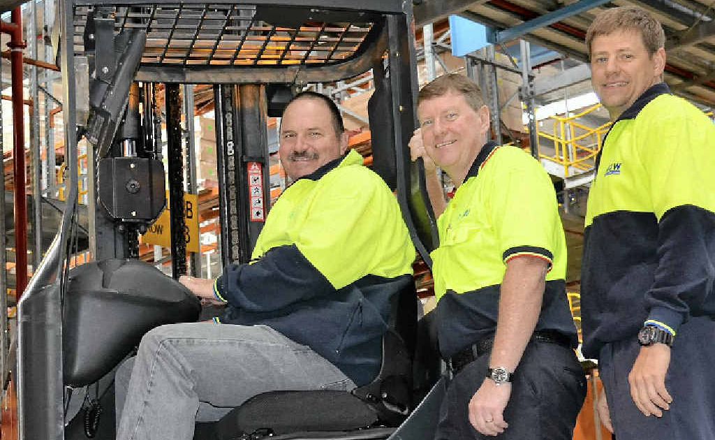 Preparing for the Big W DC open day on Saturday are (from left) trainee associate Warren Hodgson, HR manager Ian Jamieson and safety, health and environment manager Garry Spence. Preparing for the Big W DC open day on Saturday are (from left) trainee associate Warren Hodgson, HR manager Ian Jamieson and safety, health and environment manager Garry Spence.